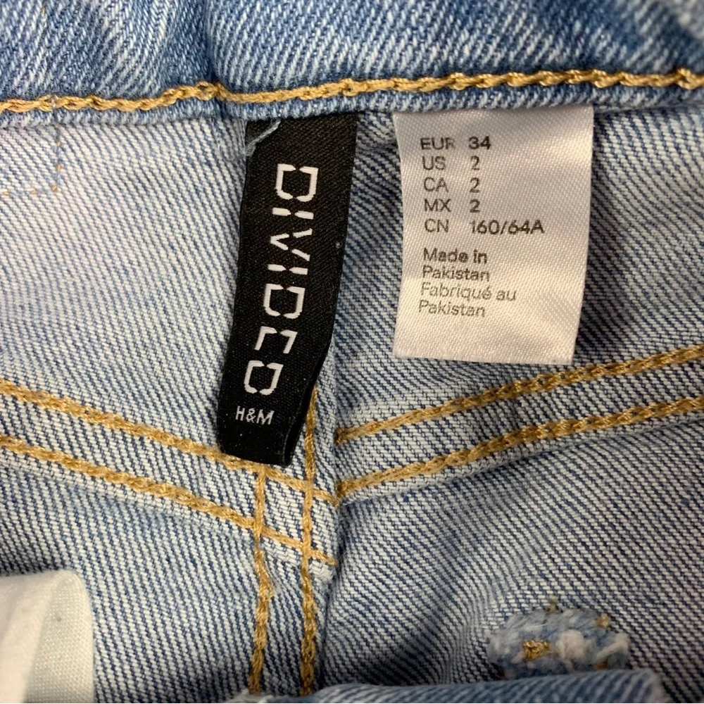 H&M Divided high rise‎ tapered leg blue jeans